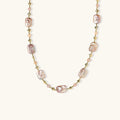 Iridescent baroque pearls alternating with small freshwater pearls on 14K gold-plated chain